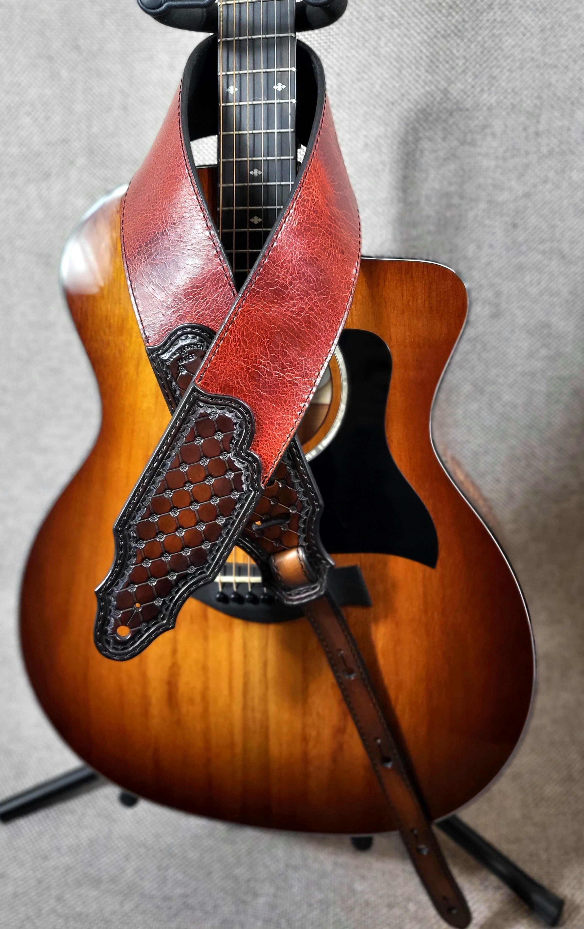This guitar strap is a Tandy Leather kit that comes plain veg